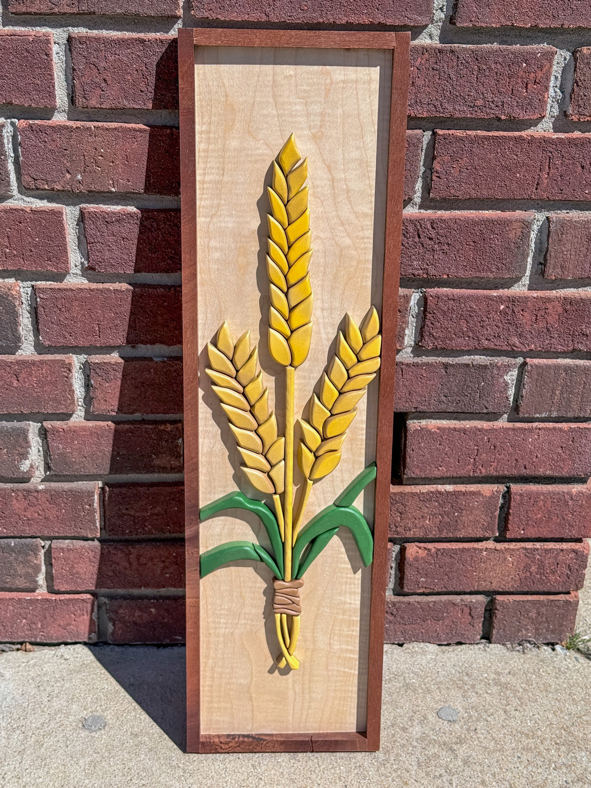 Close-up of wheat stalk detail, layered wood art